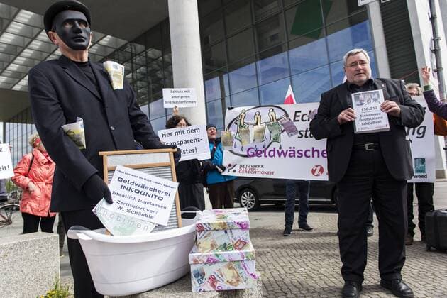 Bilder des Tages April 24, 2017 - Berlin, Berlin, Germany - On the occasion of the public hearing in the Finance Committee of the German Bundestag, the non-governmental organizations Attac, Netzwerk Steuergerechtigkeit Deutschland, Tax Justice Network and WEED are protesting at the Paul-LoÂ¶be-Haus. They call for a revision of the German implementation of the 4th EU Money Laundering Directive. In the opinion of the organizers, the planned transparency register is not sufficiently effective against tax evasion, money laundering and corruption. Member of Parliament Dr. AXEL TROOST (Left Party) appeared as a speaker. Berlin Germany - ZUMAs172 20170424_zap_s172_007 Copyright: xJanxScheunertx
