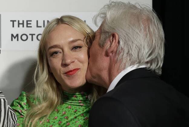 Chloe Sevigny gets a kiss from Richard Gere when they arrive on the red carpet at The Dinner Premiere at BMCC Tribeca PAC on April 24, 2017 in New York City.  NYP20170424151 JOHNxANGELILLO
