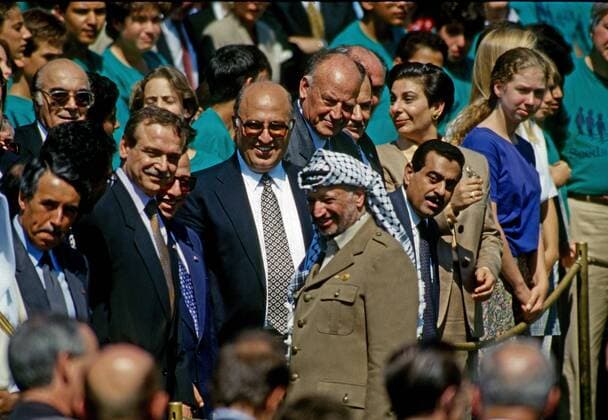 September 13, 1993 - Washington, District of Columbia, U.S - Palestine Liberation Organization Chairman Yasser Arafat greets other memebrs of the Arabic countries that are gathered to witness the signing of the Israeli-Palestinian Declaration of Principles peace accords at a White House South Lawn ceremony, Washington, DC., September 13, 1993. Washington U.S. - ZUMAr142 19930913_zap_r142_006 Copyright: xMarkxReinsteinx