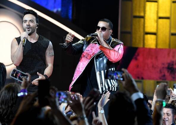 Latin artist Daddy Yankee (R) and Luis Fonsi perform during the 2017 Billboard Latin Music Awards and Show at the Bank United Center, University of Miami, Miami, Florida on April 27, 2017.  MIA201704272695 GARYxIxROTHSTEIN