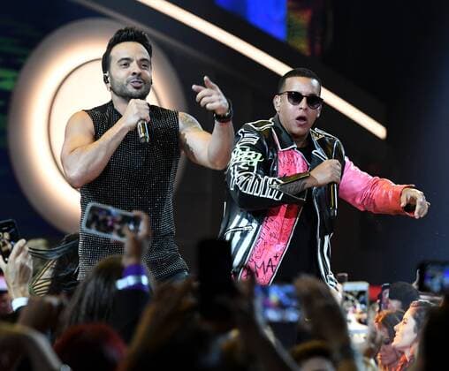 Latin artist Daddy Yankee (R) and Luis Fonsi perform during the 2017 Billboard Latin Music Awards and Show at the Bank United Center, University of Miami, Miami, Florida on April 27, 2017.  MIA201704272696 GARYxIxROTHSTEIN