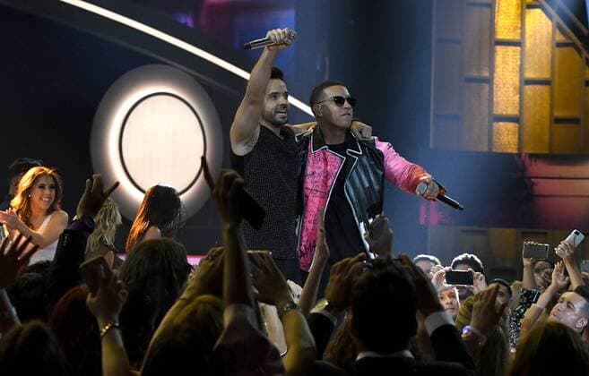 Latin artist Daddy Yankee (R) and Luis Fonsi perform during the 2017 Billboard Latin Music Awards and Show at the Bank United Center, University of Miami, Miami, Florida on April 27, 2017.  MIA201704272697 GARYxIxROTHSTEIN