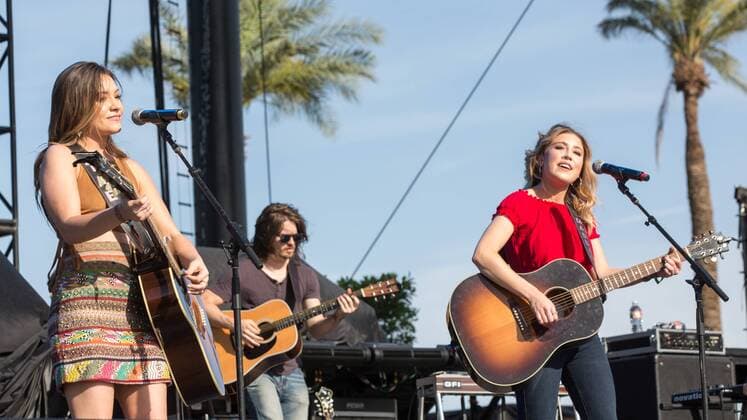 April 28, 2017 - Indio, California, U.S - TAYLOR DYE and MADISON MARLOW of Maddie & Tae during Stagecoach Music Festival in Indio, California Indio U.S. - ZUMAs135 20170428_zap_s135_032 Copyright: xDanielxDeSloverx