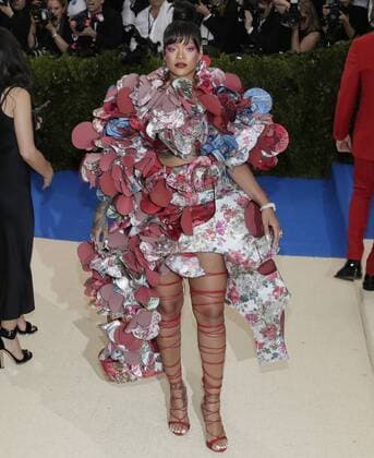 Rihanna arrives on the red carpet at the Costume Institute Benefit at The Metropolitan Museum of Art celebrating the opening of Rei Kawakubo Comme des Garcons: Art of the In-Between in New York City on May 1, 2017.  NYP20170501542 JOHNxANGELILLO