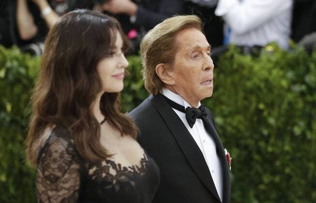 Monica Bellucci and Valentino Garavani arrive on the red carpet at the Costume Institute Benefit at The Metropolitan Museum of Art celebrating the opening of Rei Kawakubo Comme des Garcons: Art of the In-Between in New York City on May 1, 2017.  NYP20170501612 JOHNxANGELILLO