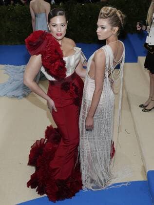 Stella Maxwell and Ashley Graham arrive on the red carpet at the Costume Institute Benefit at The Metropolitan Museum of Art celebrating the opening of Rei Kawakubo Comme des Garcons: Art of the In-Between in New York City on May 1, 2017.  NYP20170501593 JOHNxANGELILLO