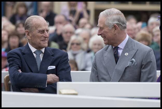 Prince Philip is to completely retire from royal duties aged 95 after supporting his wife in public for 70 years. . 27 10 2016. London, United Kingdom. Hm The Queen Visits Poundbury Dorset. Britain s Prince Philip, Duke of Edinburgh (L) and Prince Charles, Prince of Wales (R) listen to speeches before a statue of the Queen Elizabeth The Queen Mother was unveiled whilst on a visit to the town of Poundbury, southwest England, on October 27, 2016. The Queen and The Duke of Edinburgh, accompanied by The Prince of Wales and The Duchess of Cornwall, visited Poundbury. Poundbury is an experimental new town on the outskirts of Dorchester in southwest England designed by Leon Krier with traditional urban principles championed by The Prince of Wales and built on land owned by the Duchy of Cornwall.  xi-Images xPoolx IIM-15035-0129