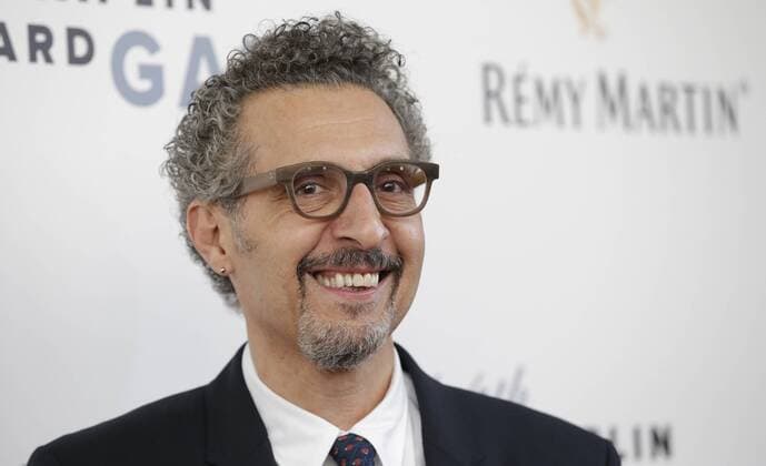 John Turturro arrives on the red carpet at the 44th Chaplin Award Gala honoring Robert De Niro at David H. Koch Theater at Lincoln Center on May 8, 2017 in New York City.  NYP20170508116 JOHNxANGELILLO