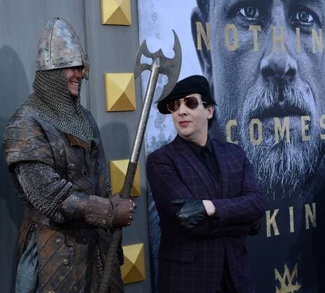 Musician Marilyn Manson attends the premiere of the motion picture fantasy King Arthur: Legend of the Sword at TCL Chinese Theatre in the Hollywood section of Los Angeles on May 8, 2017. Storyline: Robbed of his birthright, Arthur comes up the hard way in the back alleys of the city. But once he pulls the sword from the stone, he is forced to acknowledge his true legacy - whether he likes it or not.  LAP20170508927 JIMxRUYMEN