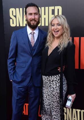 Actress Kate Hudson and musician Danny Fujikawa attend the premiere of the motion picture comedy Snatched at the Regency Village Theatre in the Westwood section of Los Angeles on May 10, 2017. Storyline: When her boyfriend dumps her before their exotic vacation, a young woman persuades her ultra-cautious mother to travel with her to paradise, with unexpected results.  LAP2017051010 JIMxRUYMEN
