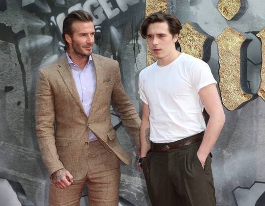 European premiere of King Arthur: Legend of the Sword London, UK. David Beckham and Brooklyn Beckham at King Arthur: Legend of the Sword - European film premiere at the Cineworld Empire, Leicester Square, London on May 10th 2017. LMK73-J287-110517 