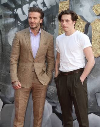 European premiere of King Arthur: Legend of the Sword London, UK. David Beckham and Brooklyn Beckham at King Arthur: Legend of the Sword - European film premiere at the Cineworld Empire, Leicester Square, London on May 10th 2017. LMK73-J287-110517 