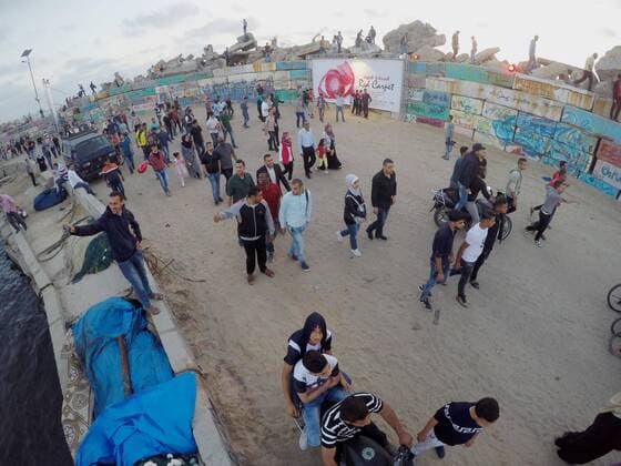 May 12, 2017 - Gaza City, Gaza Strip, Palestinian Territory - Palestinians arrive to attend the 3rd Annual Red Carpet Festival for Human Rights Films at the Gaza seaport, on May 12, 2017. The Red Carpet Festival is held in the Gaza Strip this year for the third year in a raw, amid international and Arab attention. This year, the Hash-Tag of the festival will be Let s go back , which coincides with one hundred years for The Balfour Declaration, where the text of the Balfour Declaration is printed on the carpet Gaza City Palestinian Territory - ZUMAap3_ 20170512_zaf_ap3_024 Copyright: xMohammedxAsadx
