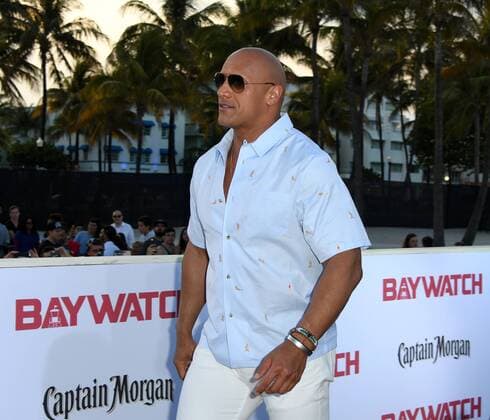 Cast member Dwayne Johnson attends the US premiere of the motion picture Baywatch in Lummus Park, Miami Beach, Florida, May 13, 2017. The movie is a remake of the TV series that ran from 1989-2001.  MIA20170513167 GARYxIxROTHSTEIN