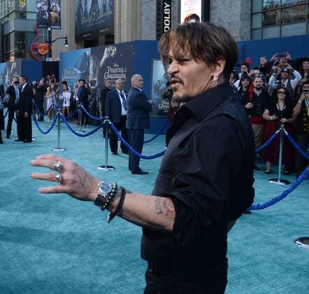 Cast member Johnny Depp attends the premiere of the premiere of the motion picture fantasy Pirates of the Caribbean: Dead Men Tell No Tales at the Dolby Theatre in the Hollywood section of Los Angeles on May 18, 2017. Storyline: Captain Jack Sparrow searches for the legendary trident of Poseidon, a powerful artifact that bestows upon its possessor total control over the seas.  LAP2017051858 JIMxRUYMEN