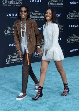 Rapper Wiz Khalifa (L) and a guest attend the premiere of the premiere of the motion picture fantasy Pirates of the Caribbean: Dead Men Tell No Tales at the Dolby Theatre in the Hollywood section of Los Angeles on May 18, 2017. Storyline: Captain Jack Sparrow searches for the legendary trident of Poseidon, a powerful artifact that bestows upon its possessor total control over the seas.  LAP2017051860 JIMxRUYMEN