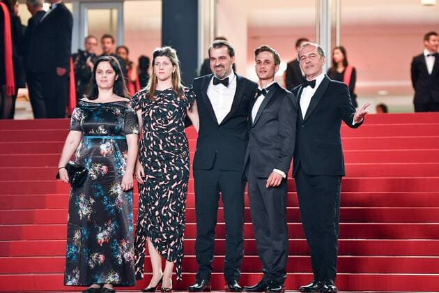 (170520) -- CANNES, May 20, 2017 -- Producer Viktoria Petranyi, screenwriter Kata Weber, director Kornel Mundruczo, actor Zsombor Jeger and actor Merab Ninidze (from L to R) pose for photos on the red carpet for the screening of the film Jupiter s Moon in competition at the 70th Cannes Film Festival in Cannes, France on May 19, 2017. ) (zw) FRANCE-CANNES-70TH CANNES FILM FESTIVAL-JUPITER S MOON-RED CARPET ChenxYichen 
