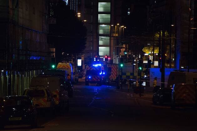 May 23, 2017 - Manchester, England, United Kingdom - An ambulance goes in to the cordoned off area, outside the Manchester Arena, after an explosion after the Ariana Grande concert which took place on 05 22 2017 at Manchester Arena in Manchester, United Kingdom on Tuesday, May 23rd, 2017. Greater Manchester Police are treating this as terrorist incident. Manchester United Kingdom  - ZUMAn230 20170523_zaa_n230_035 Copyright: xJonathanxNicholsonx