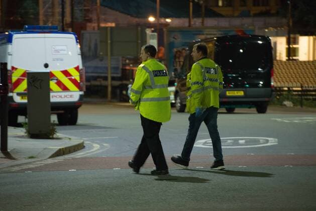 May 23, 2017 - Manchester, England, United Kingdom - Police officers guard the cordoned off area, outside the Manchester Arena, after an explosion after the Ariana Grande concert which took place on 05 22 2017 at Manchester Arena in Manchester, United Kingdom on Tuesday, May 23rd, 2017. Greater Manchester Police are treating this as terrorist incident. Manchester United Kingdom  - ZUMAn230 20170523_zaa_n230_042 Copyright: xJonathanxNicholsonx