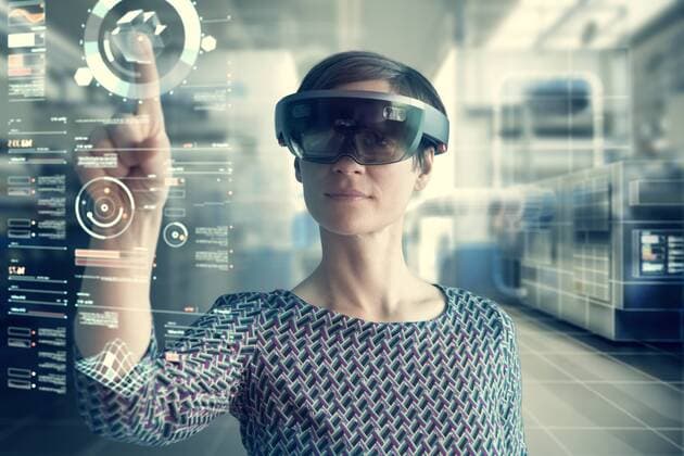 Woman wearing mixed reality smartglasses touching transparent screen model released Symbolfoto property released  RBF05665