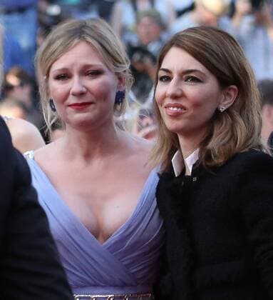 Kirsten Dunst (L) and Sofia Coppola arrive on the red carpet before the screening of the film The Beguiled during the 70th annual Cannes International Film Festival in Cannes, France on May 24, 2017.  CAN20170524053 DAVIDxSILPA