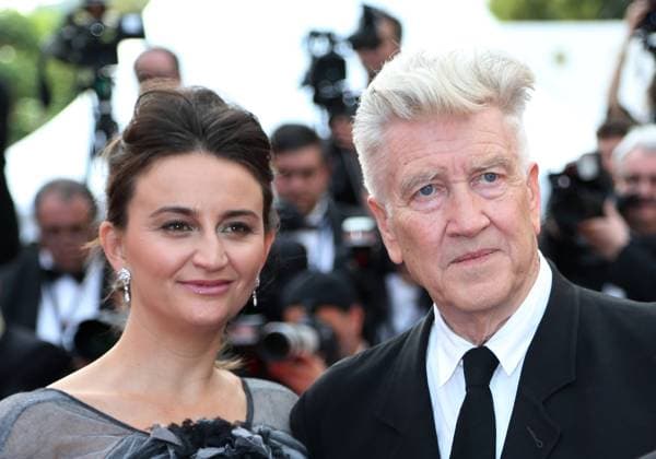 Emily Stofle (L) and David Lynch arrive on the red carpet before the screening of Twin Peaks during the 70th annual Cannes International Film Festival in Cannes, France on May 25, 2017.  CAN20170525719 DAVIDxSILPA