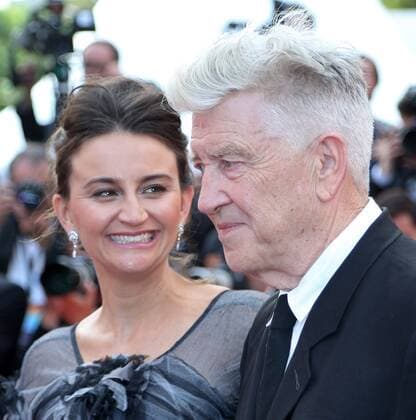 Emily Stofle (L) and David Lynch arrive on the red carpet before the screening of Twin Peaks during the 70th annual Cannes International Film Festival in Cannes, France on May 25, 2017.  CAN20170525720 DAVIDxSILPA