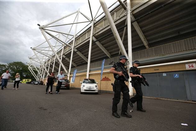 . 28 05 2017. Darlington, United Kingdom. Armed police at UB40 gig. Northern Echo Arena. Armed police patrol outside The Northern Echo arena in Darlington while it hosts a music event including bands UB40 and Level 42.  xChrisxBoothx xi-Imagesx IIM-15204-0002