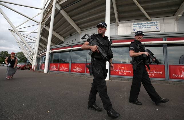 . 28 05 2017. Darlington, United Kingdom. Armed police at UB40 gig. Northern Echo Arena. Armed police patrol outside The Northern Echo arena in Darlington while it hosts a music event including bands UB40 and Level 42.  xChrisxBoothx xi-Imagesx IIM-15204-0005