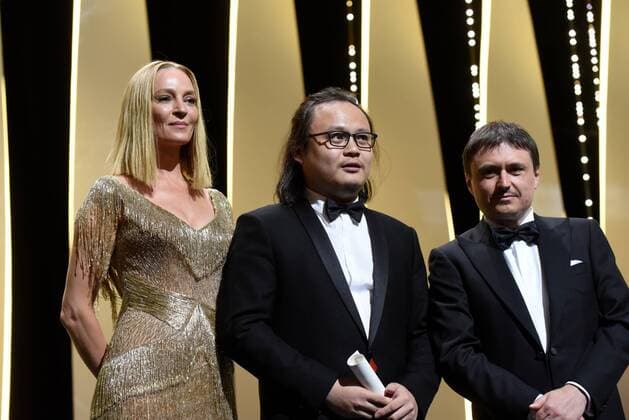 Uma Thurman, Qiu Yang, Cristian Miungu CINEMA : 70 eme Festival de Cannes - ceremonie de cloture - 28 05 2017 LOICThebaud Panoramic 