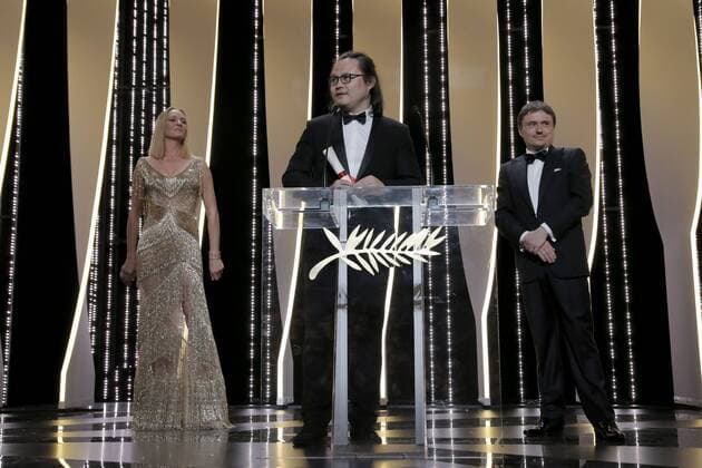 70eme Festival du Film de Cannes - Ceremonie de cloture. Photo: Laurent Guerin E Press Photo Uma Thurman;Cristian Mungiu; Qiu Yang Cannes France  521781