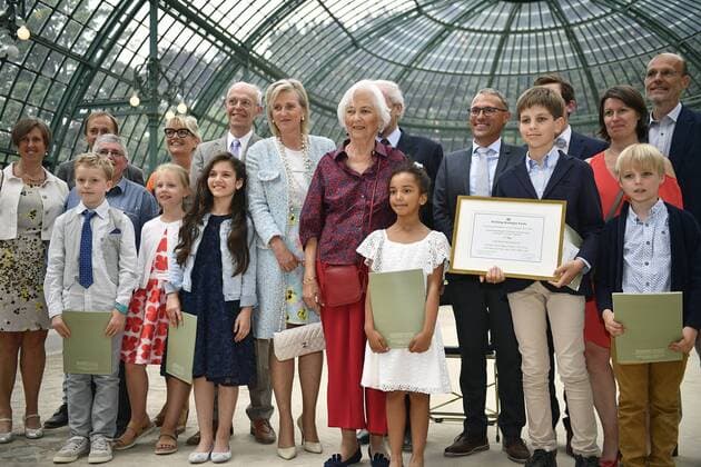 Princess Astrid of Belgium and Queen Paola of Belgium pose for a group picture during a ceremony for the Queen Paola Award 2015-2016 (Koningin Paolaprijs - Prix Reine Paola) for education, at the royal castle in Laken Laeken, Brussels, Wednesday 31 May 2017. This year s themes are sciences, mathematics and technology.  ERICxLALMAND 05106901