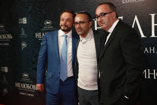 MOSCOW, RUSSIA - MAY 31, 2017: Producers Gleb Fetisov (L), Alexander Rodnyansky (R), and director Andrey Zvyagintsev (C) at the premiere of director Andrey Zvyagintsev s latest film Nelyubov Loveless . Zvyagintsev has won the Jury Prize for the film at the 70th Cannes Film Festival. Alexander Shcherbak TASS  TS050FA0