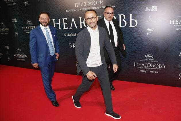 MOSCOW, RUSSIA - MAY 31, 2017: Producers Gleb Fetisov (L), Alexander Rodnyansky (R), and director Andrey Zvyagintsev (C) at the premiere of director Andrey Zvyagintsev s latest film Nelyubov Loveless . Zvyagintsev has won the Jury Prize for the film at the 70th Cannes Film Festival. Alexander Shcherbak TASS  TS050FA5