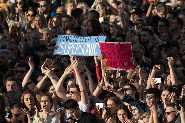 June 4, 2017 - Manchester, Greater Manchester, UK - Manchester , UK . A placard reading Manchester is Supersonic and another reading One love one heart and one soul is held aloft in the audience . The One Love Manchester benefit concert for victims of the Manchester Arena terrorist attack , at the Emirates Old Trafford Cricket Stadium . Ariana Grande, Justin Bieber, Coldplay, Katy Perry, Miley Cyrus, Pharrell Williams, Usher, Take That, Robbie Williams, Black Eyed Peas and Niall Horan are amongst the performers. Manchester UK - ZUMAl94_ 20170604_zaf_l94_232 Copyright: xJoelxGoodmanx
