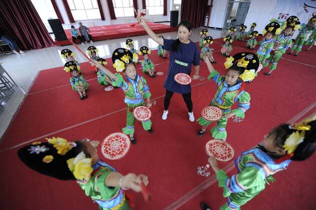 (170607) -- CHENGDE, June 7, 2017 -- Pupils exercise Taiping Drum Dance in the guidance of a teacher at a primary school in Chengde City, north China s Hebei Province, June 7, 2017. ) (zwx) CHINA-CHENGDE-TRADITIONAL CULTURE-EDUCATION (CN) WangxLiqun 