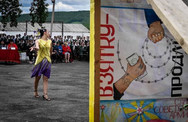 PRIMORYE TERRITORY, RUSSIA â€“ JUNE 7, 2017: A convict showcases a creation during a fashion show at female penal colony No 10 in the village of Gornoye. Prisoners of the colony sew clothes at a garment factory and every year they celebrate Day of Light Industry by presenting the clothes they made. Yuri Smityuk TASS  TS051F5F