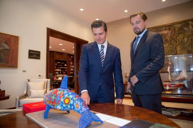 June 8, 2017 - Mexico City, DF, Mexico - Mexican President Enrique Pena Nieto, left, and actor Leonardo DiCaprio view a folk sculpture of the Vaquita, a critically endangered porpoise native to Mexico s Gulf of California, at the presidential palace Los Pinos June 8, 2017 in Mexico City, Mexico. DiCaprio is joining forces with Pena Nieto and Mexican billionaire Carlos Slim to try and save the Vaquita from extinction. Mexico City Mexico - ZUMAp138 20170608_zaa_p138_003 Copyright: xPresidenciamxx