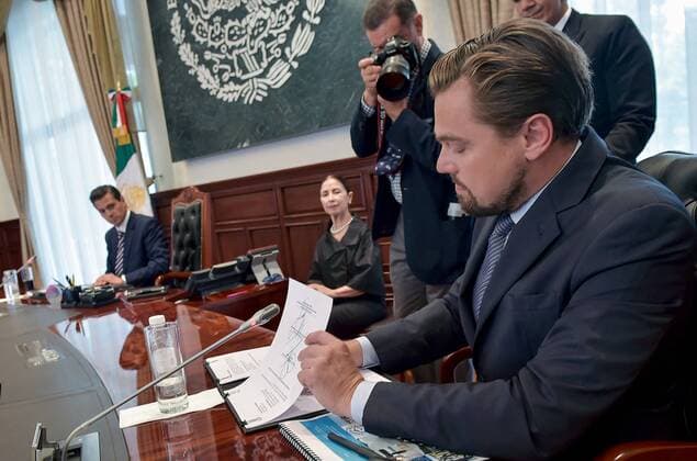 June 8, 2017 - Mexico City, DF, Mexico - Actor Leonardo DiCaprio, right, signs a Memorandum of Understanding agreeing to make commitments to prevent the Vaquita from extinction as Mexican President Enrique Pena Nieto, left, looks on at the presidential palace Los Pinos June 8, 2017 in Mexico City, Mexico. DiCaprio is joining forces with Pena Nieto and Mexican billionaire Carlos Slim to try and save the Vaquita, a critically endangered porpoise native to Mexico s Gulf of California, from extinction. Mexico City Mexico - ZUMAp138 20170608_zaa_p138_001 Copyright: xJulioxCesarxHernandezxReyesx