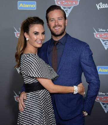 Cast member Armie Hammer the voice of Jackson Storm in the animated motion picture comedy Cars 3 and his wife, actress Elizabeh Chambers attend the premiere of the film at the Anaheim Convention Center in Anaheim, California on June 10, 2017. Storyline: Lightning McQueen sets out to prove to a new generation of racers that he s still the best race car in the world.  LAP2017061045 JIMxRUYMEN