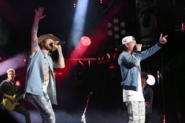 June 10, 2017 - Nashville, Tennessee, United States - 10 June 2017 - Nashville, Tennessee - Brian Kelley and Tyler Hubbard, Florida Geogria Line. 2017 CMA Music Festival Nightly Concert held at Nissan Stadium. Photo Credit: Dara-Michelle Farr AdMedia Nashville United States - ZUMAa123 20170610_zaa_a123_436 Copyright: xDara-MichellexFarr Admediax