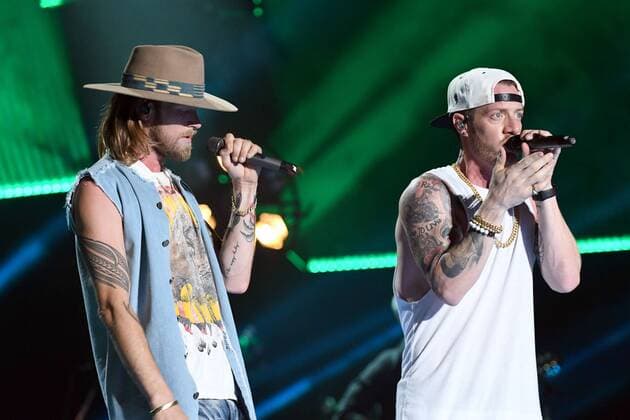 June 10, 2017 - Nashville, Tennessee, United States - 10 June 2017 - Nashville, Tennessee - Brian Kelley and Tyler Hubbard, Florida Geogria Line. 2017 CMA Music Festival Nightly Concert held at Nissan Stadium. Photo Credit: Dara-Michelle Farr AdMedia Nashville United States - ZUMAa123 20170610_zaa_a123_443 Copyright: xDara-MichellexFarr Admediax