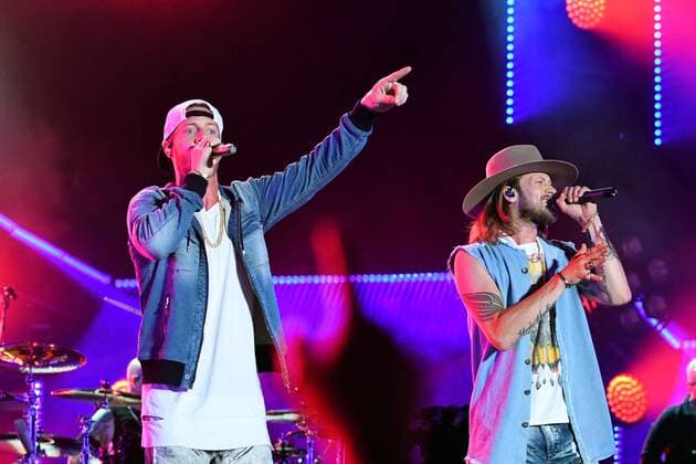 June 10, 2017 - Nashville, Tennessee, United States - 10 June 2017 - Nashville, Tennessee - Brian Kelley and Tyler Hubbard, Florida Geogria Line. 2017 CMA Music Festival Nightly Concert held at Nissan Stadium. Photo Credit: Dara-Michelle Farr AdMedia Nashville United States - ZUMAa123 20170610_zaa_a123_456 Copyright: xDara-MichellexFarr Admediax