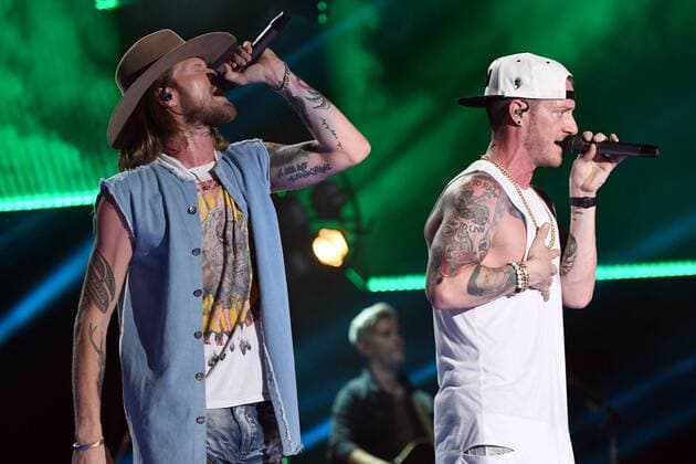 June 10, 2017 - Nashville, Tennessee, United States - 10 June 2017 - Nashville, Tennessee - Brian Kelley and Tyler Hubbard, Florida Geogria Line. 2017 CMA Music Festival Nightly Concert held at Nissan Stadium. Photo Credit: Dara-Michelle Farr AdMedia Nashville United States - ZUMAa123 20170610_zaa_a123_454 Copyright: xDara-MichellexFarr Admediax