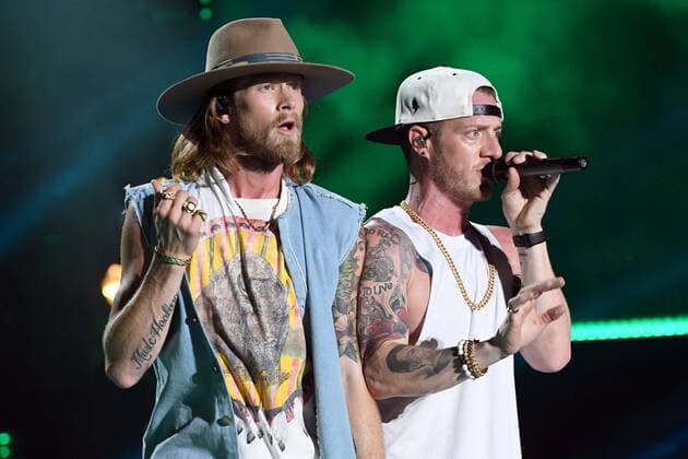 June 10, 2017 - Nashville, Tennessee, United States - 10 June 2017 - Nashville, Tennessee - Brian Kelley and Tyler Hubbard, Florida Geogria Line. 2017 CMA Music Festival Nightly Concert held at Nissan Stadium. Photo Credit: Dara-Michelle Farr AdMedia Nashville United States - ZUMAa123 20170610_zaa_a123_457 Copyright: xDara-MichellexFarr Admediax