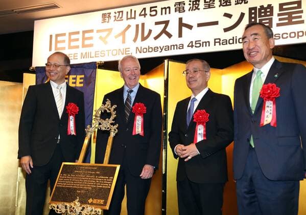 June 14, 2017, Tokyo, Japan - National Astronomical Observatory of Japan (NAOJ) Director General Masahiko Hayashi (L) and Mistubishi Electric president Masaki Sakuyama (R) receive a plaque of Institute of Electrical and Electronics Engineers (IEEE) Milestone award from IEEE president-elect James Jefferies (2nd L) and Iwao Sasase (2nd R), IEEE Tokyo section chief in Tokyo on Wednesday, June 14, 2017. NAOJ s Nobeyama 45-meters radio telescope has been recognized for an IEEE Milestone as the world s largestmillimeter-wave radio telescope to discover a supermassive black hole.  (lwxa011363)