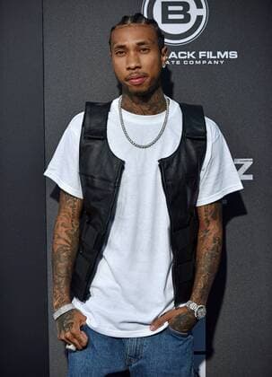 Tyga arrives for the premiere of All Eyez on Me at the Westwood Village Theaters in Los Angeles, California on June 14, 2017.  LAP20170614827 CHRISTINExCHEW