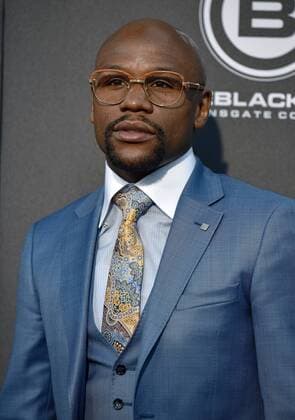 Boxer Floyd Mayweather arrives for the premiere of All Eyez on Me at the Westwood Village Theaters in Los Angeles, California on June 14, 2017.  LAP20170614822 CHRISTINExCHEW