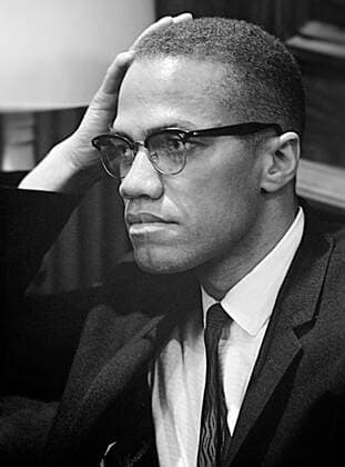 Malcolm X waiting for a press conference to begin on March 26, 1964. Photo by By Marion S. Trikosko  Copyright: xMarionxS.xTrikoskox 1003_618THA
