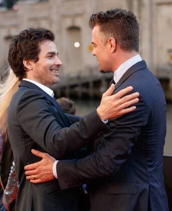 Actor John Duhamel greets fellow actor Santiago Cabrera as they arrive on the red carpet at the Transformers The Last Knight movie Premiere on June 20, 2017 in Chicago.  CHI2017062025 JOHNxGRESS